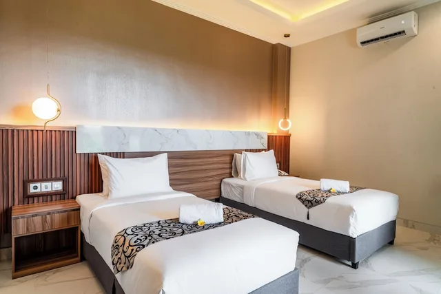 غرفة ديلوكس بسريرين منفصلين، Ayers Hotel and Resto 1/1