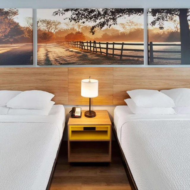 Deluxe, 2 Queen Beds, Days Inn & Suites by Wyndham Siler City 5/7