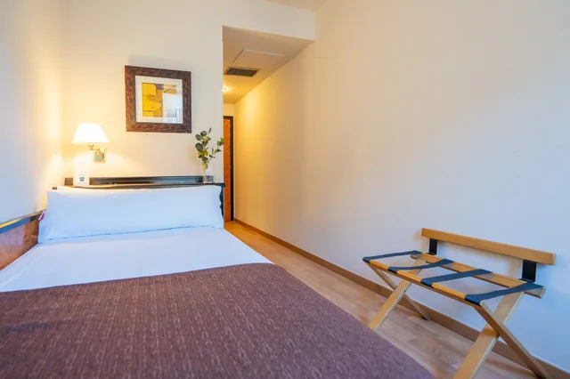 غرفة مفردة، Glories Hotel 3/16