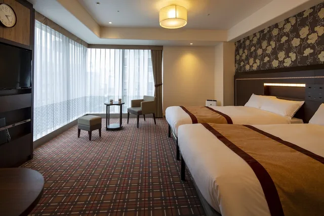 غرفة ديلوكس بسريرين منفصلين في طابق مرتفع في الطابق العلوي، Hotel Monterey Fukuoka 1/8