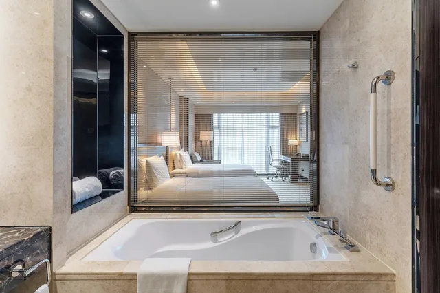 غرفة اقتصادية بسريرين مزدوجين، Junluxe Hotel Guangzhou Zengcheng 2/2