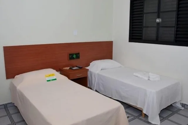 غرفة قياسية رباعية بسرير مزدوج وسريرين منفصلين، Carolina Plaza Hotel 5/7