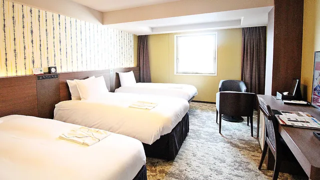 غرفة قياسية ثلاثية للمدخنين، Richmond Hotel Kochi 1/1