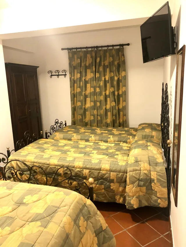 غرفة رباعية بإطلالة على الحديقة، Hotel Bucaneve 7/10