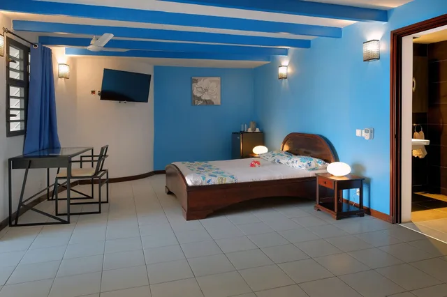 غرفة عائلية كبيرة بسريرين كوين بإطلالة على الحديقة بشرفة، Villa Les Orchidées 1/6