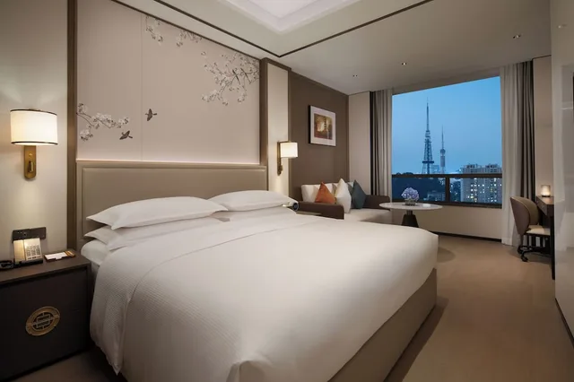 جناح ديلوكس بسرير كينج، Yuexiu Hotel Guangzhou, Curio Collection by Hilton 2/8