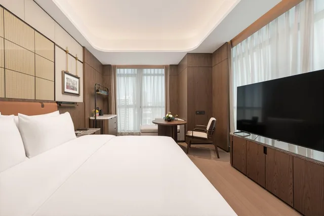 غرفة بريميير بسرير كينج للمدخنين، Wyndham Fuzhou Gulou 1/6