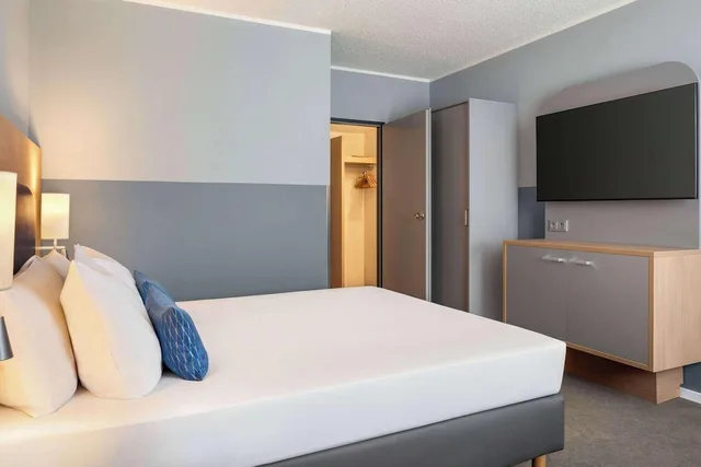 غرفة قياسية بسريرين منفصلين، Vienna House Easy by Wyndham Frankfurt Airport 2/4