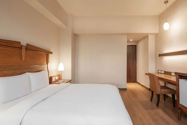 غرفة اقتصادية بسرير مزدوج، Kindness Hotel Wu Jia 1/7