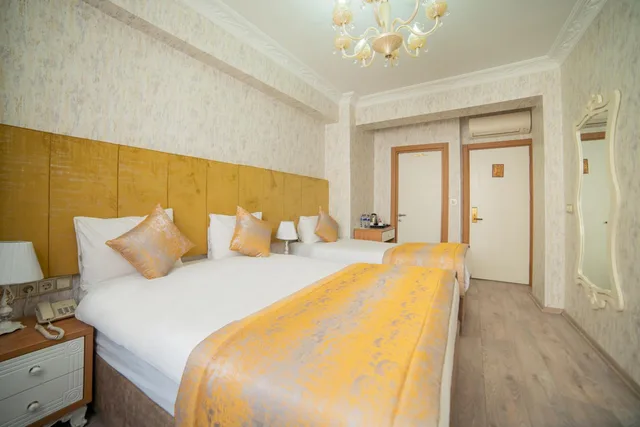 غرفة سوبيريور ثلاثية بسرير مزدوج وسرير فردي، MIRAN HOTEL 1/1