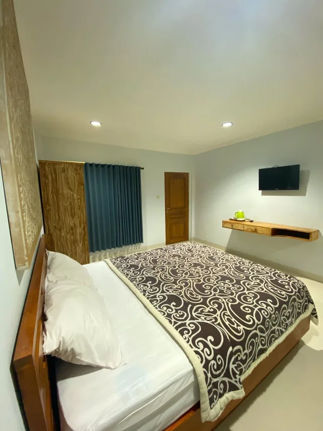 غرفة قياسية بسرير مزدوج بشرفة، Agung Cottages Legian 1/2