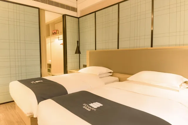 غرفة كومفورت بسريرين منفصلين وسرير كينج، Echarm Hotel Lujiang Zhouyu Avenue 1/1