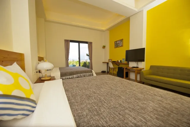 غرفة قياسية رباعية بسريرين كوين بإطلالة على البحر، The Tree Bed and Breakfast 3/4