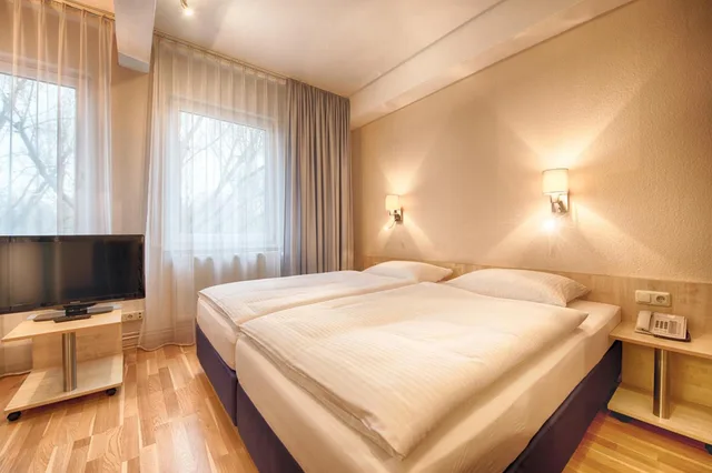 غرفة كبيرة بسرير مزدوج أو سريرين منفصلين، Enjoy Hotel Berlin City Messe 2/4
