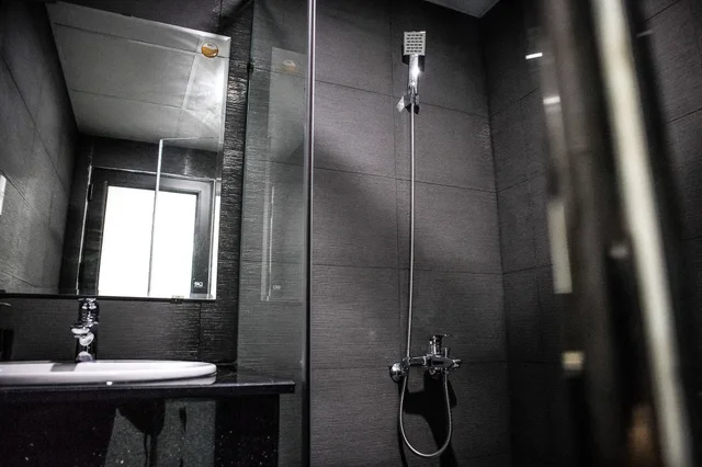 غرفة مريحة ديلوكس بسرير كينج في طابق مرتفع، Robin Hotel Danang 4/4