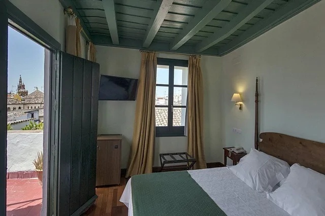 غرفة أساسية بسريرين منفصلين في الملحق، Las Casas De La Juderia Sevilla 3/10