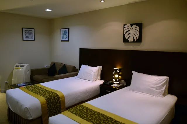 شقة بسرير كينج وسرير كوين وسريرين فرديين بـ4 غرف نوم بمطبخ صغير، Auckland City Hotel 4/10