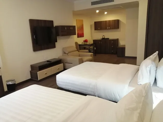 غرفة ديلوكس بسرير كوين، Cairo Taj Dokki Families Tower Hotel 3/7