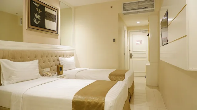 غرفة قياسية بسريرين منفصلين، Grand Savero Hotel Bogor 1/2