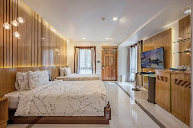 جناح عائلي بسريرين منفصلين وسرير كينج بإطلالة على البحر بغرفتي نوم، Carmelina Beach Resort 5/10
