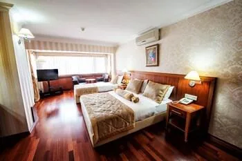 غرفة ديلوكس بسرير كينج وسرير فردي، Hotel Centrum Istanbul 1/1