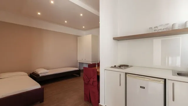 غرفة عائلية بأربعة أسرّة بغرفة نوم واحدة، Nami Hotel & Suites 4/5