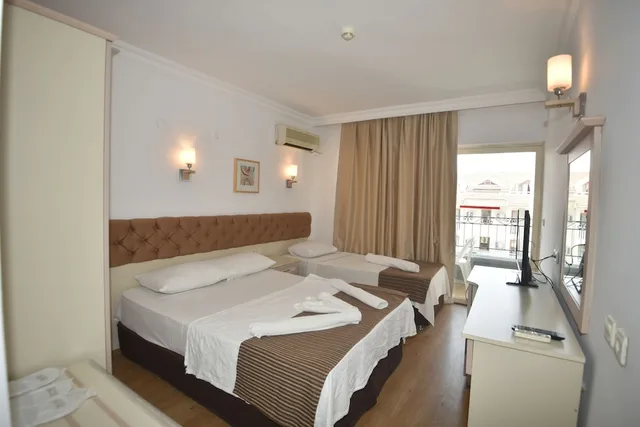 غرفة قياسية بسرير مزدوج وسرير فردي بإطلالة على المدينة، Almena City Hotel 2/9