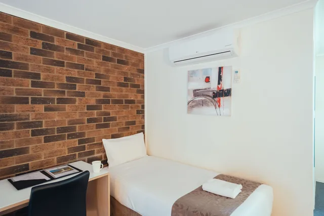 غرفة ديلوكس عائلية بسرير كوين وسريرين منفصلين، BIG WINDMILL CORPORATE & FAMILY MOTEL 4/7
