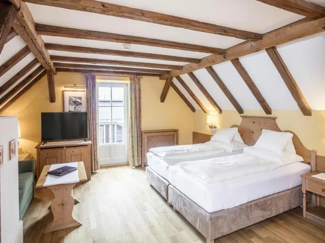 جناح جونيور مع أريكة، HOTEL TIEFENBRUNNER 1/8