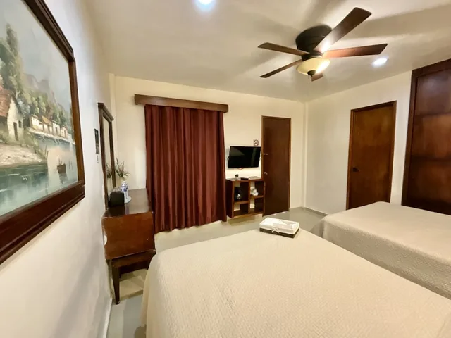 غرفة قياسية رباعية بسريرين مزدوجين، El Zaguán Colonial 3/7