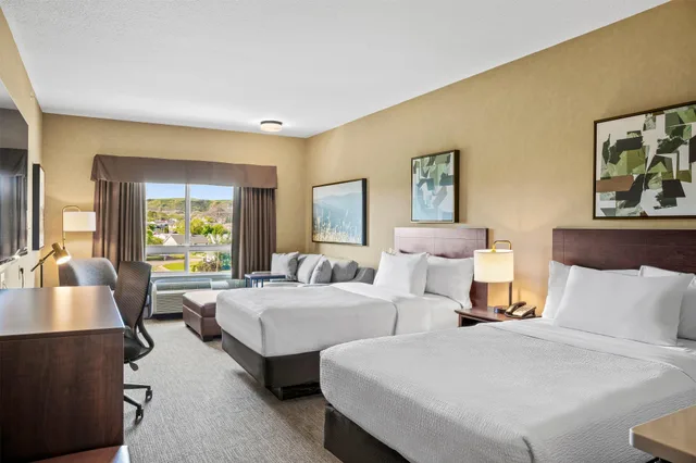 غرفة بسريرين مزدوجين، Ramada By Wyndham Drumheller Hotel & Suites 1/2