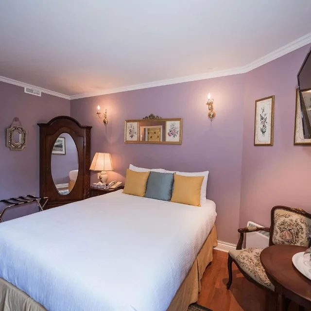 غرفة قياسية بسرير كينج وسرير كوين، Manoir Sherbrooke 2/10