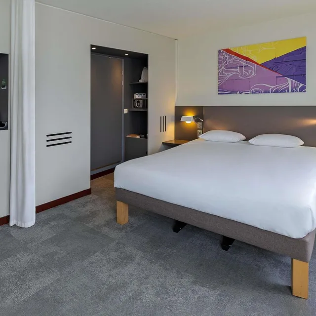 جناح سوبيريور بسرير مزدوج وسرير فردي مع أريكة، Novotel Suites Paris Stade De France 5/10