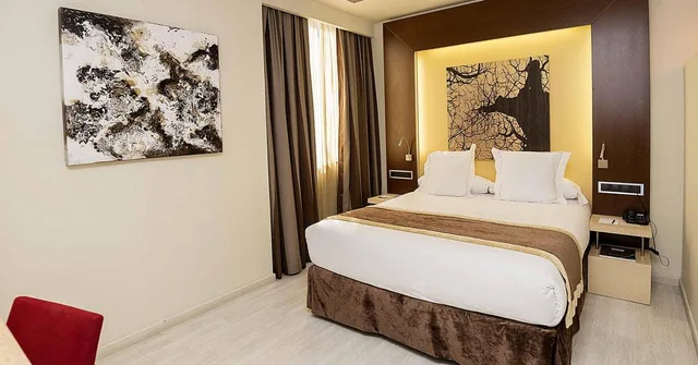 غرفة بريميوم بسرير مزدوج، Melia Avenida America 1/5