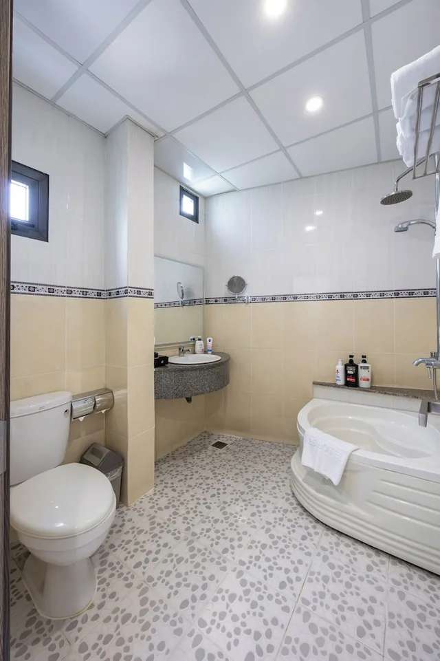 غرفة عائلية ثلاثية بسرير كوين وسرير فردي، A25 Hotel - 65G Nguyen Thai Hoc 10/10