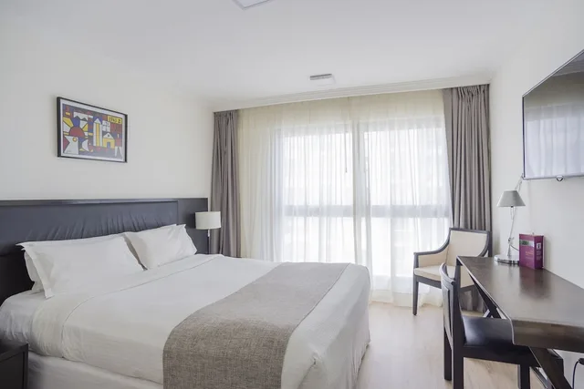 غرفة قياسية بسرير كوين لذوي الإعاقة، After Hotel Montevideo 1/2