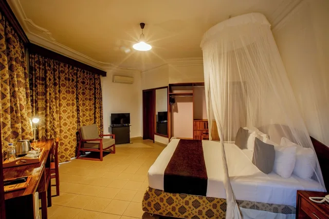 غرفة كومفورت مفردة بسرير كينج، Chez Lando Hotel 6/7
