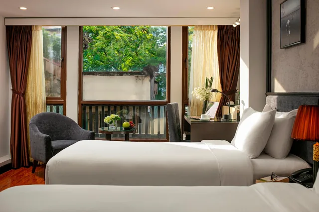 غرفة عائلية بسرير مزدوج وسرير فردي بإطلالة على المدينة، Hanoi La Palm Premier Hotel & Spa 2/2