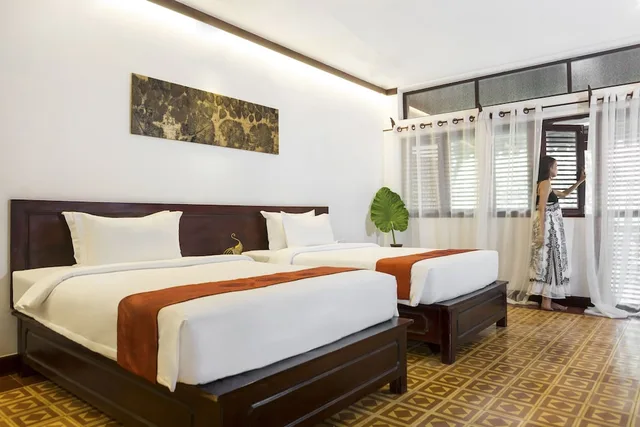 غرفة ديلوكس بسرير كينج بإطلالة على الحديقة، Montra Nivesha Residence 2/10