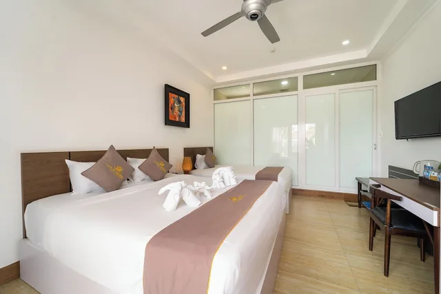غرفة سوبيريور ثلاثية بسرير مزدوج وسرير فردي، Lotus Garden Resort 3/7