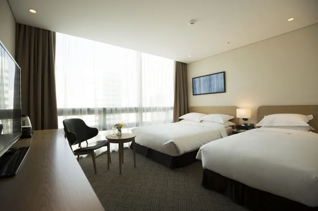 غرفة قياسية بسرير مزدوج وسرير فردي بإطلالة على المدينة، Best Western Haeundae Hotel 2/6