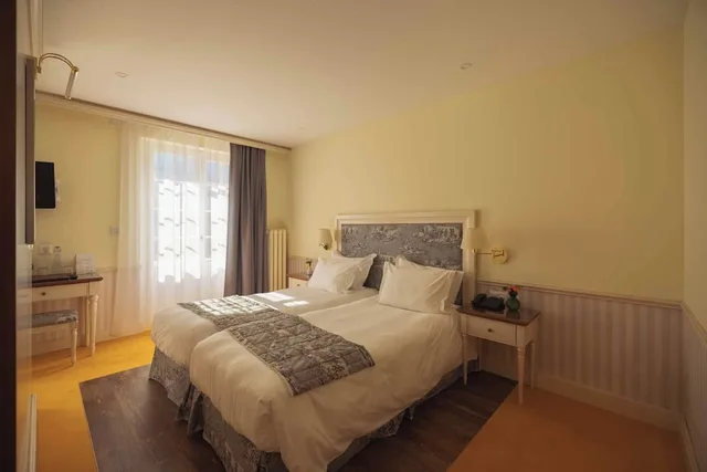 جناح جونيور بسريرين منفصلين بإطلالة على الجبل مع أريكة، Hotel Regina Wengen 3/7