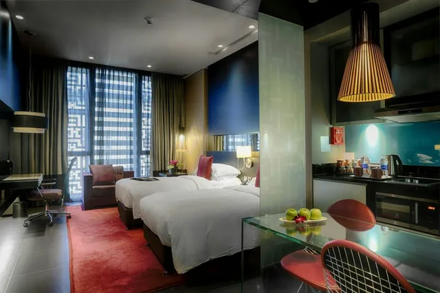 غرفة ديلوكس بسريرين منفصلين للمدخنين، The Abdali Boulevard Hotel 1/1