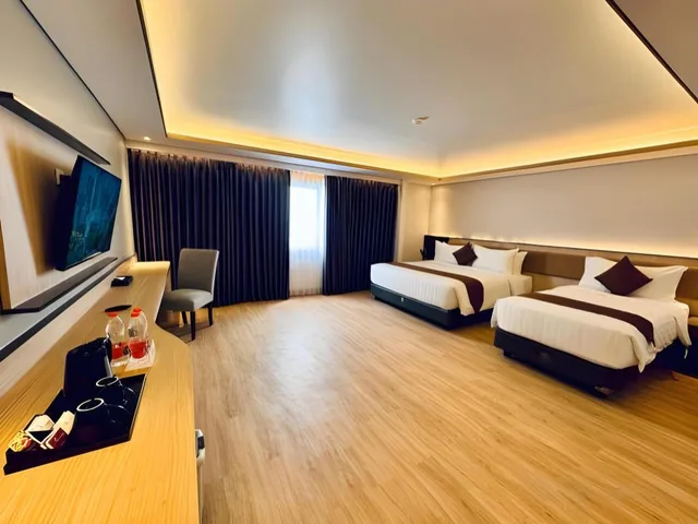 غرفة بريميير ديلوكس بسرير كينج وسرير فردي، Orchardz Hotel Industri 1/5