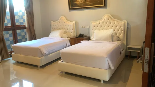 غرفة بريميير ديلوكس بسريرين منفصلين، Pesona Osing Hotel Butik 1/4