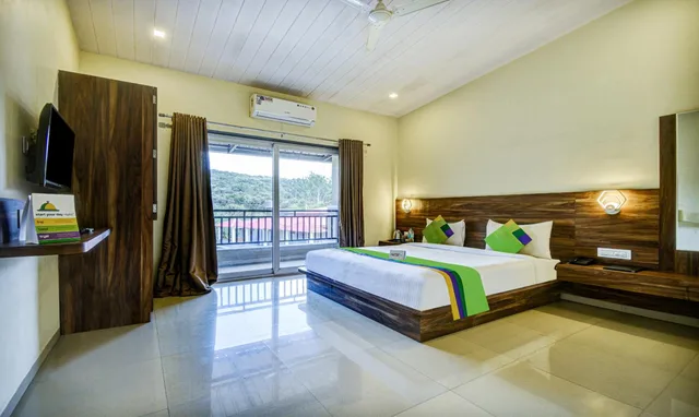 غرفة ديلوكس بسرير كوين، Treebo Jp Cottage 1/2