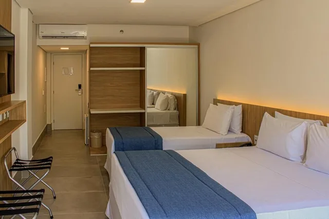 غرفة بريميوم بسرير كوين وسرير فردي بإطلالة على البحر، Maragogi Brisa Exclusive Hotel 1/8