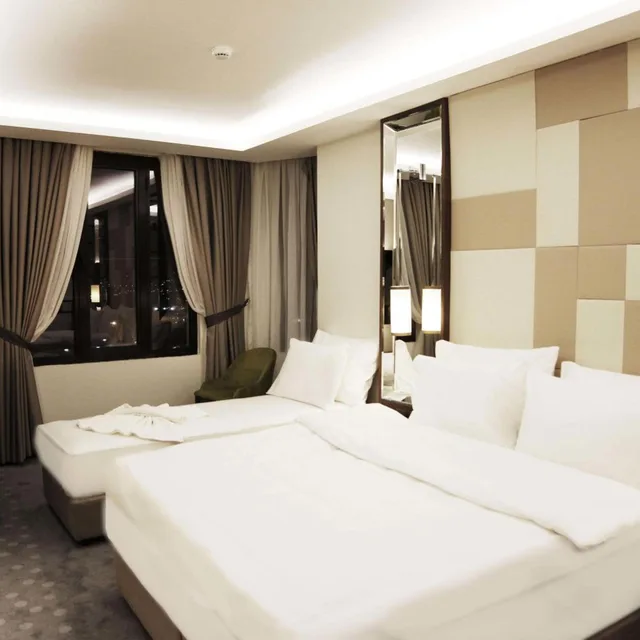 غرفة قياسية ثلاثية بسرير فردي بإطلالة على البحر، The Biancho Hotel Pera 5/7