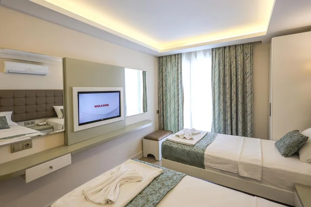 غرفة بسرير مزدوج أو سريرين منفصلين بإطلالة جزئية على البحر، Asli Hotel 10/10