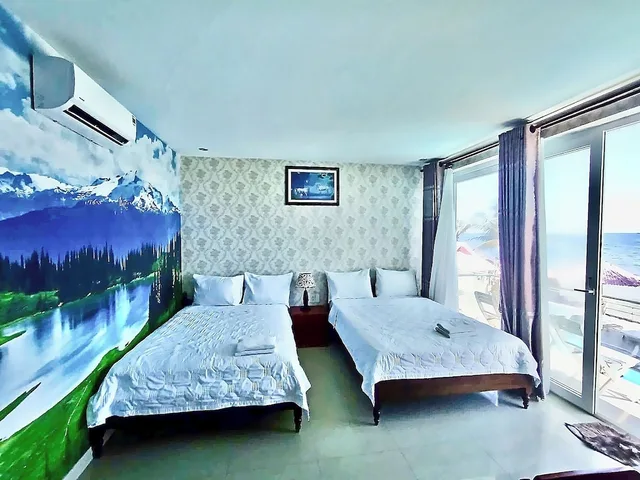 غرفة ديلوكس بسريرين منفصلين بإطلالة على الشاطئ، Hai Yen Resort 1/1